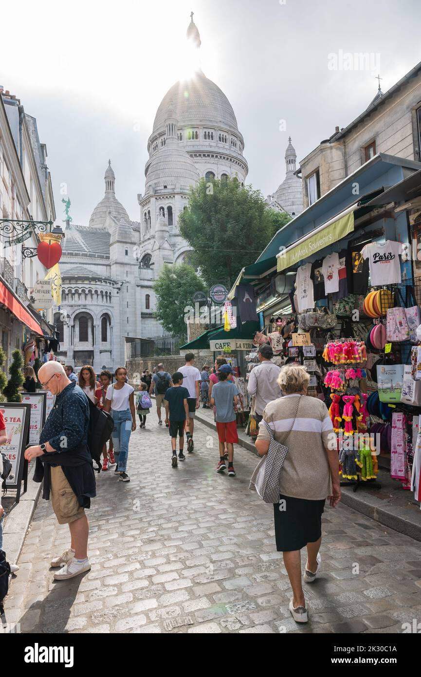 Paris, France - August 26 2022: People, artists, shops in Mormartre village, famous for its artistic heritage Stock Photo