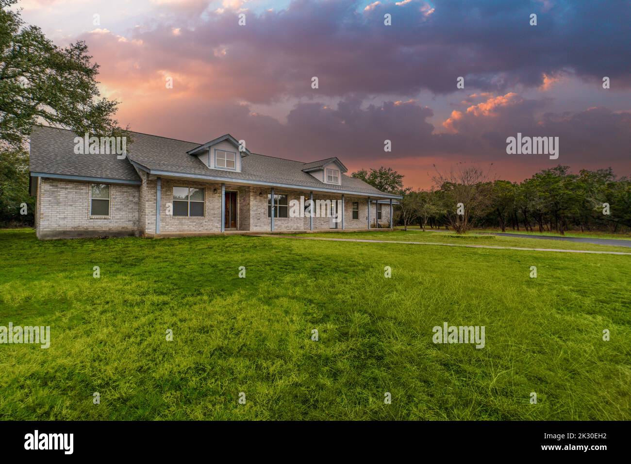 a home at sunset Stock Photo