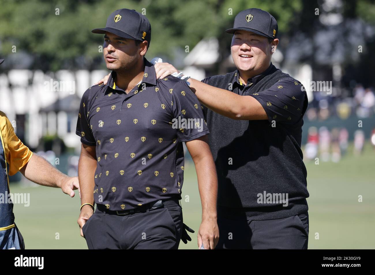 Charlotte, United States. 23rd Sep, 2022. Sungjae Im, of South Korea, right, laughs with Sebastian Munoz, of Colombia, after Munoz won the hole on the 13th during Four-Ball match play at the Presidents Cup golf championship in Charlotte, North Carolina on Friday, September 23, 2022. Photo by Nell Redmond/UPI. Credit: UPI/Alamy Live News Stock Photo