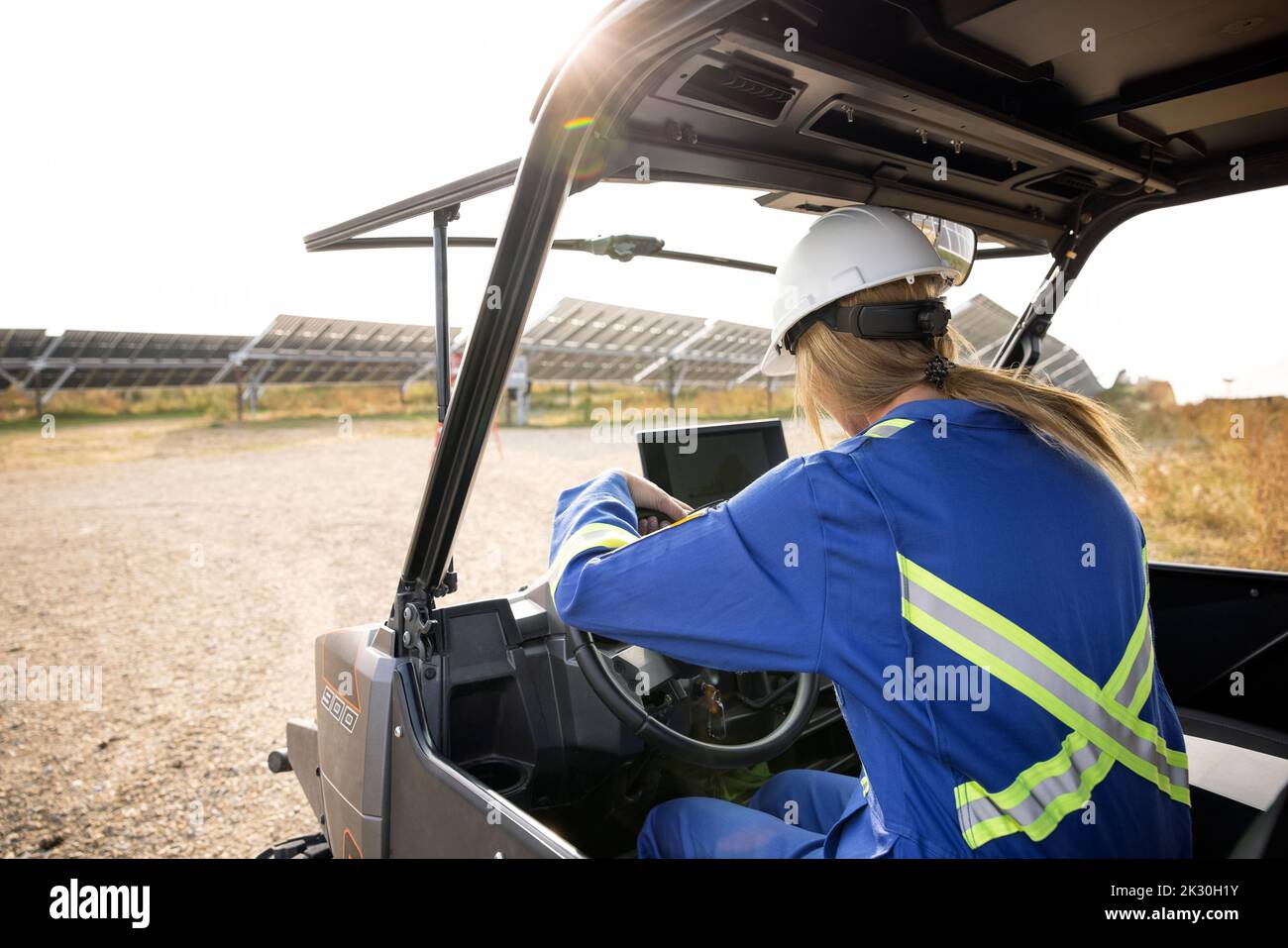Technician working on laptop in pickup truck Stock Photo Alamy