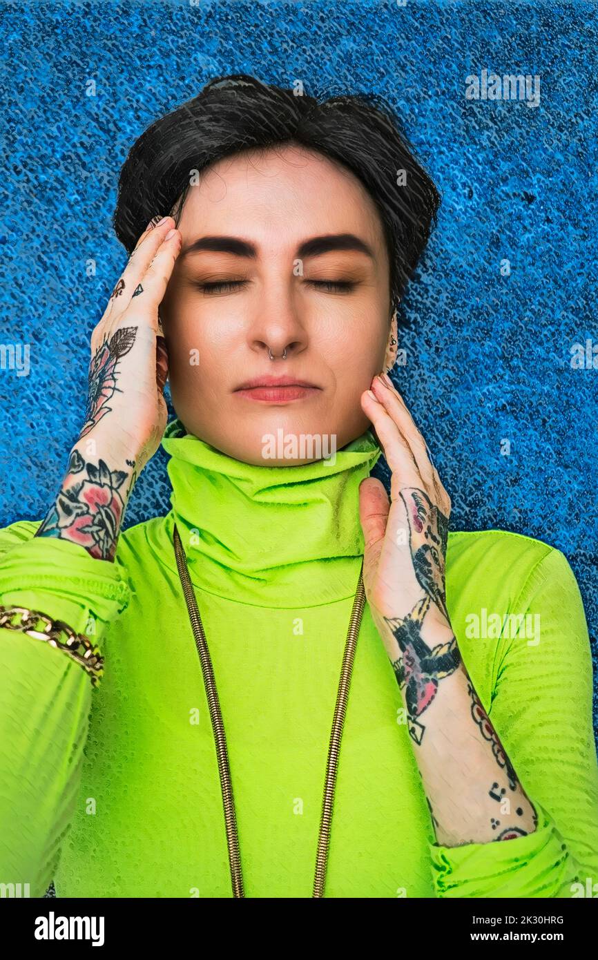 Tattooed hipster woman with eyes closed Stock Photo Alamy