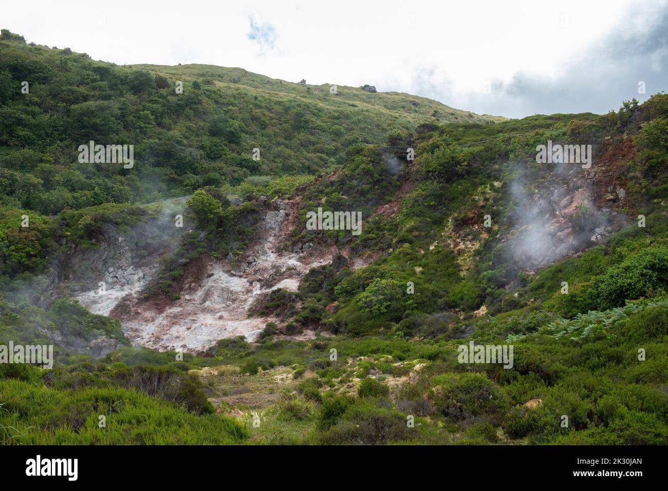 Portugal, Azores, Sulfuric vapors coming out of Furnas do Enxofre fumaroles Stock Photo