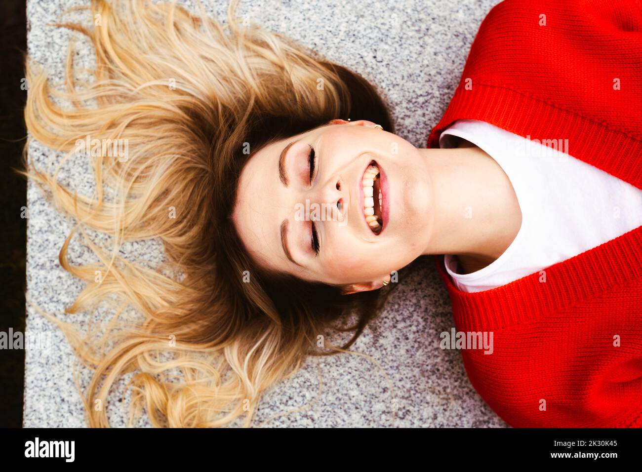 Happy young woman relaxing with eyes closed Stock Photo - Alamy