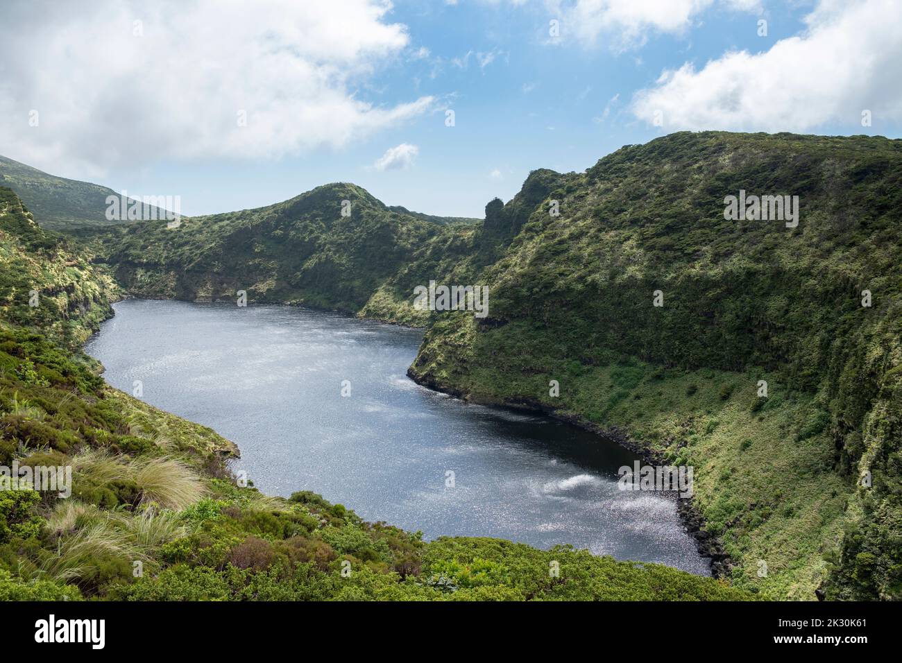 Scenic view of lake amidst Morro Alto and Pico da Se mountains, Flores Island, Azores, Portugal Stock Photo