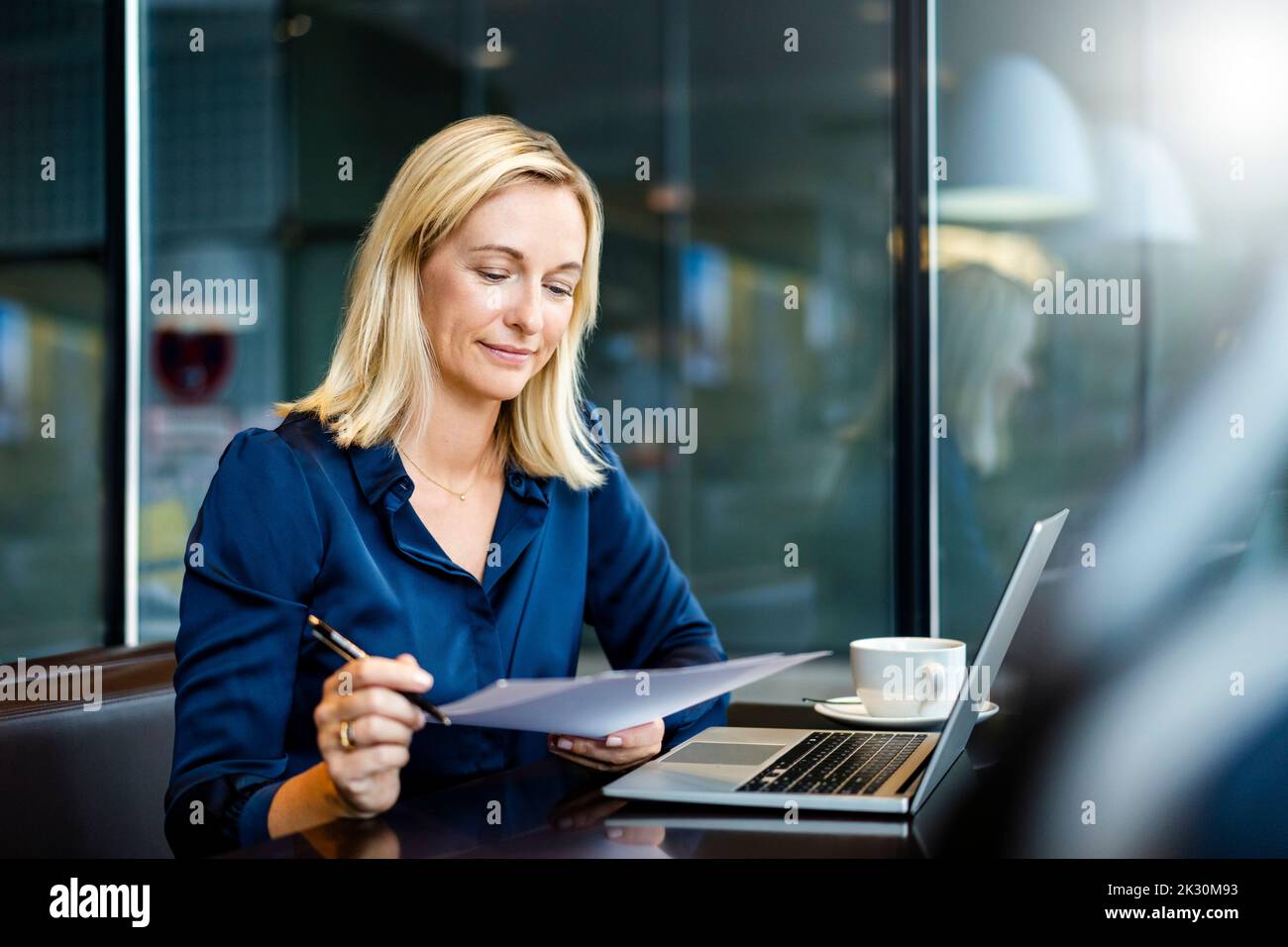 Mature woman paperwork hi-res stock photography and images - Alamy