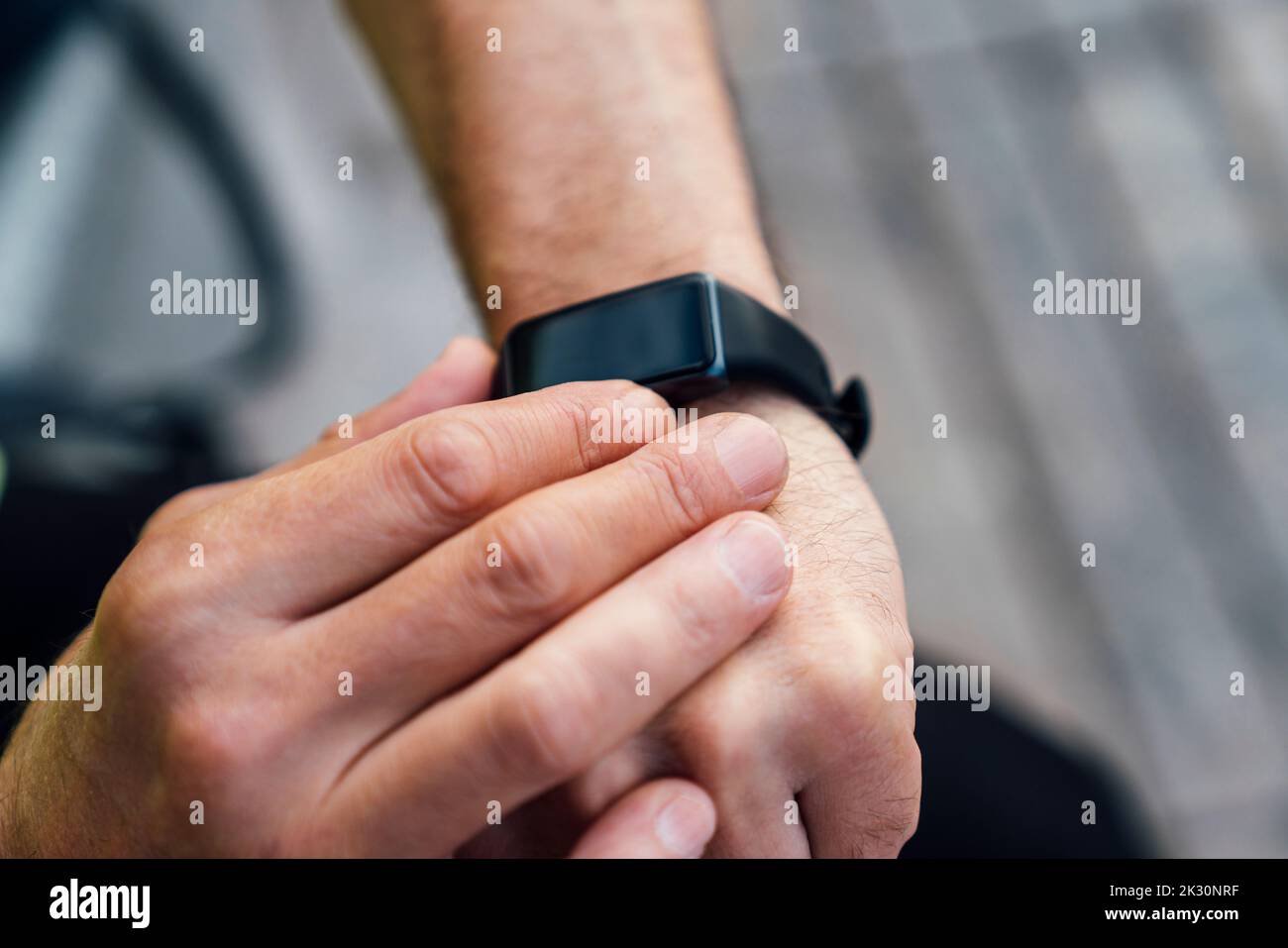 Mature man measuring heart rate in smart watch Stock Photo Alamy