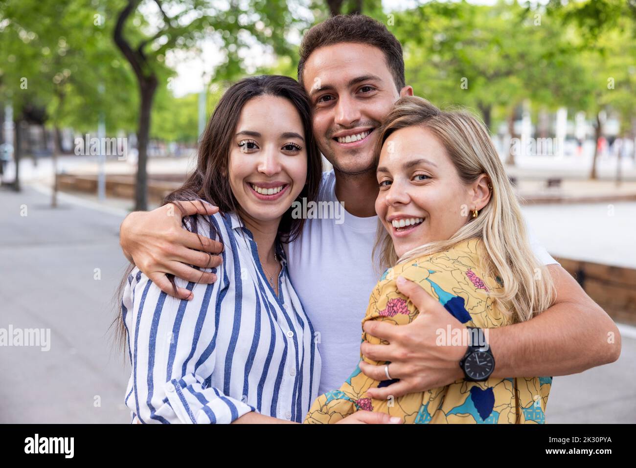 Male arms around women hi-res stock photography and images - Alamy