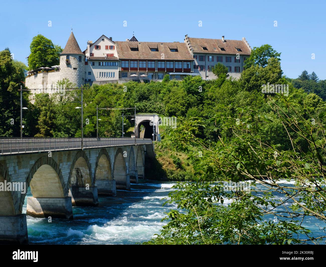 Switzerland, Canton of Zurich, Arch Bridge stretching over river Rhine with Laufen Castle in background Stock Photo