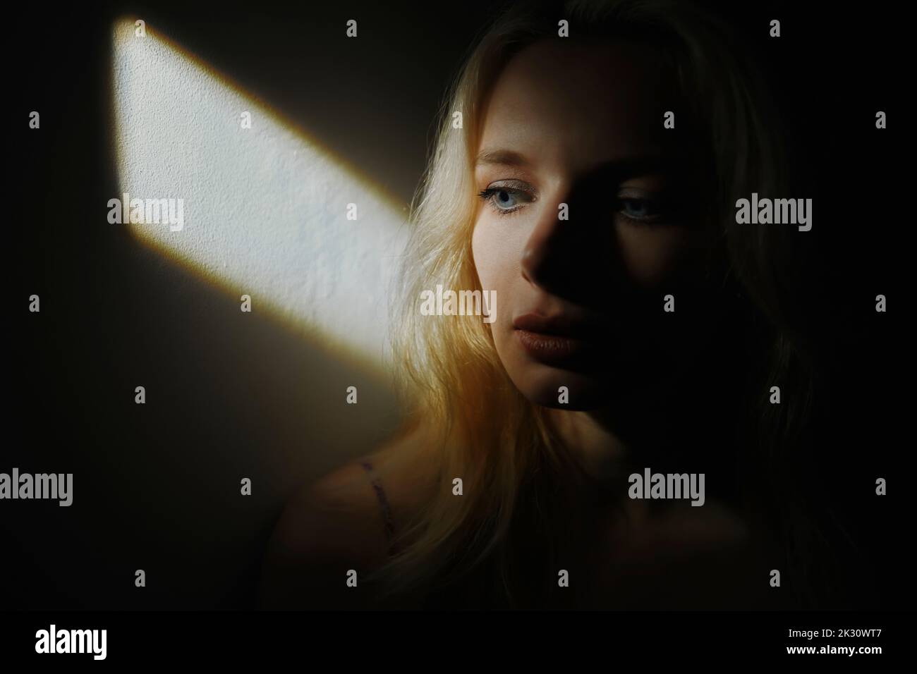 Young sad worried woman hi-res stock photography and images - Alamy