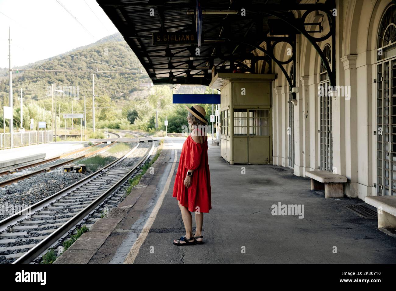 Woman platform train hi-res stock photography and images - Alamy