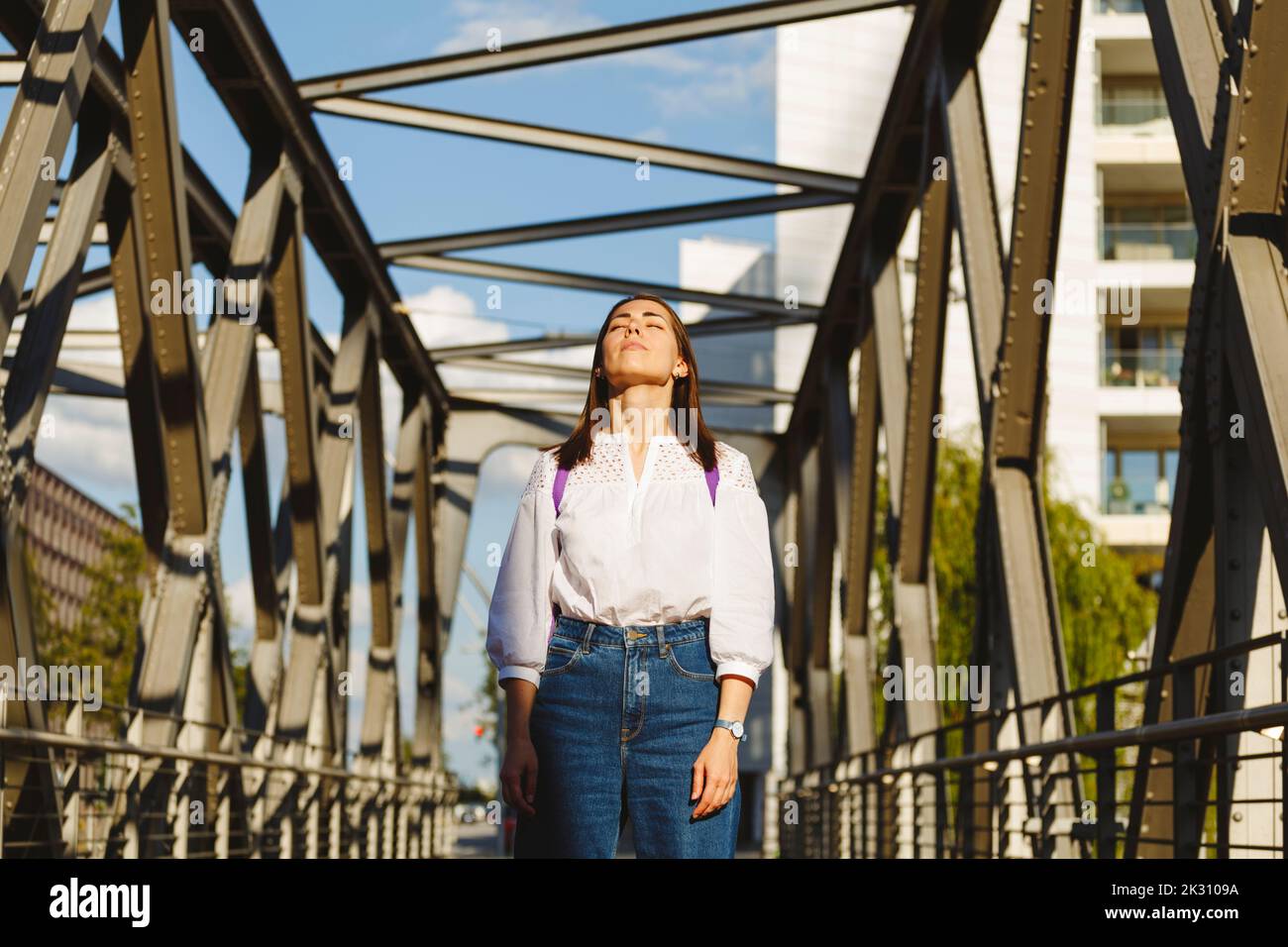 Three women on a bridge hi-res stock photography and images - Alamy