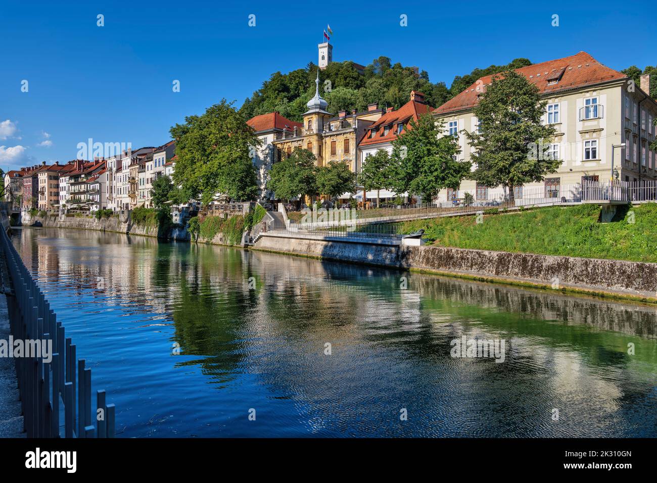 Slovenia, Ljubljana, Old town buildings standing along Ljubljanica river Stock Photo