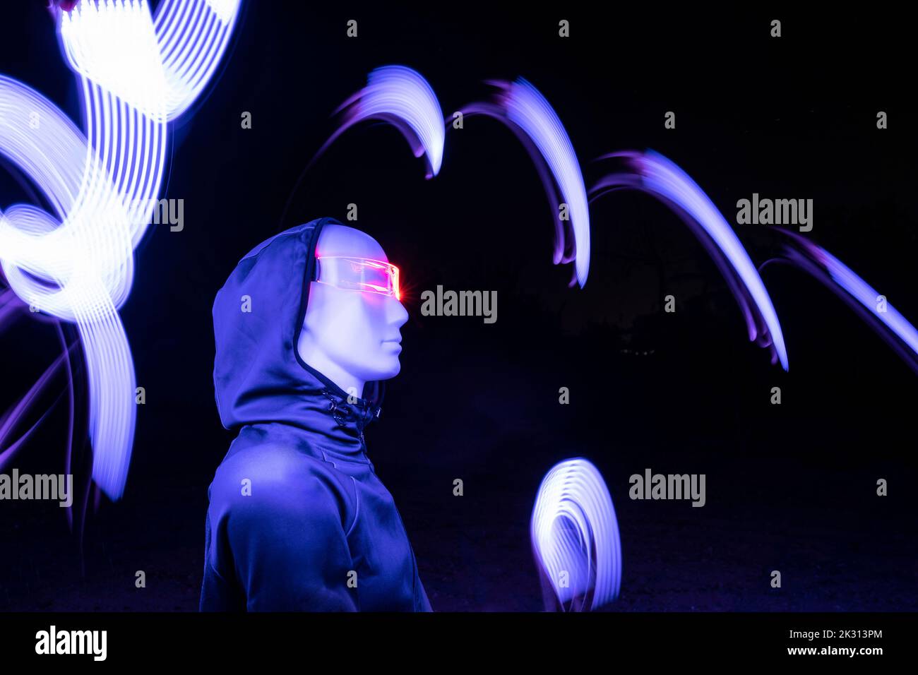 Artificial intelligence robot wearing futuristic eyeglasses standing by