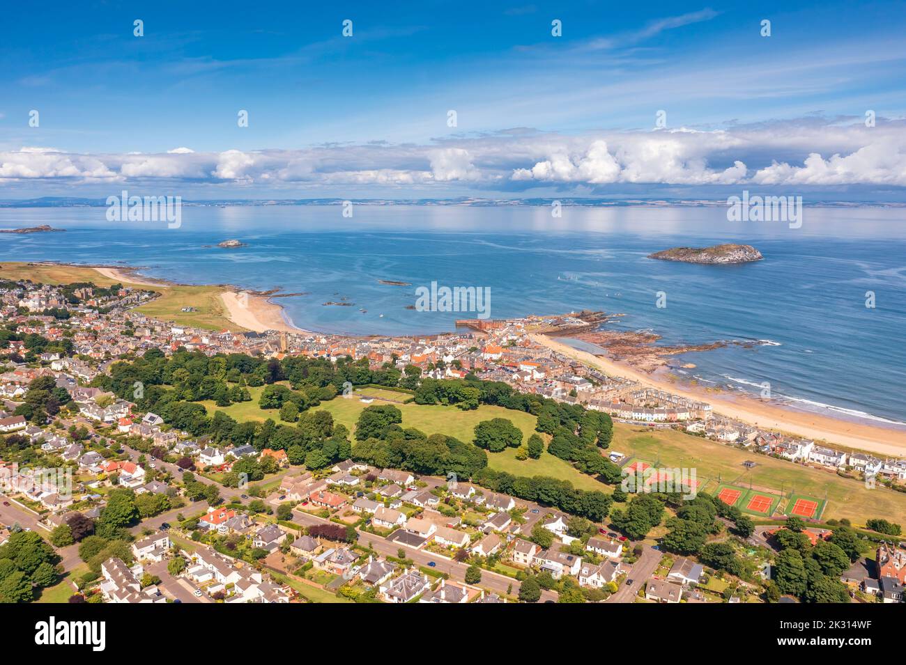 UK, Scotland, North Berwick, Aerial view of coastal town in summer with park in center Stock Photo