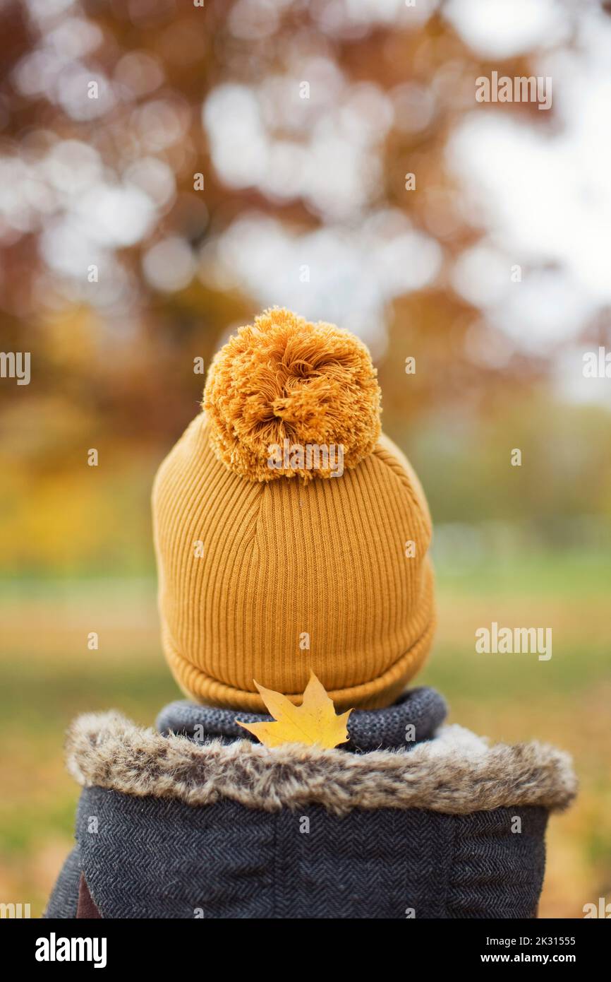 Boy wearing warm clothing and knit hat Stock Photo