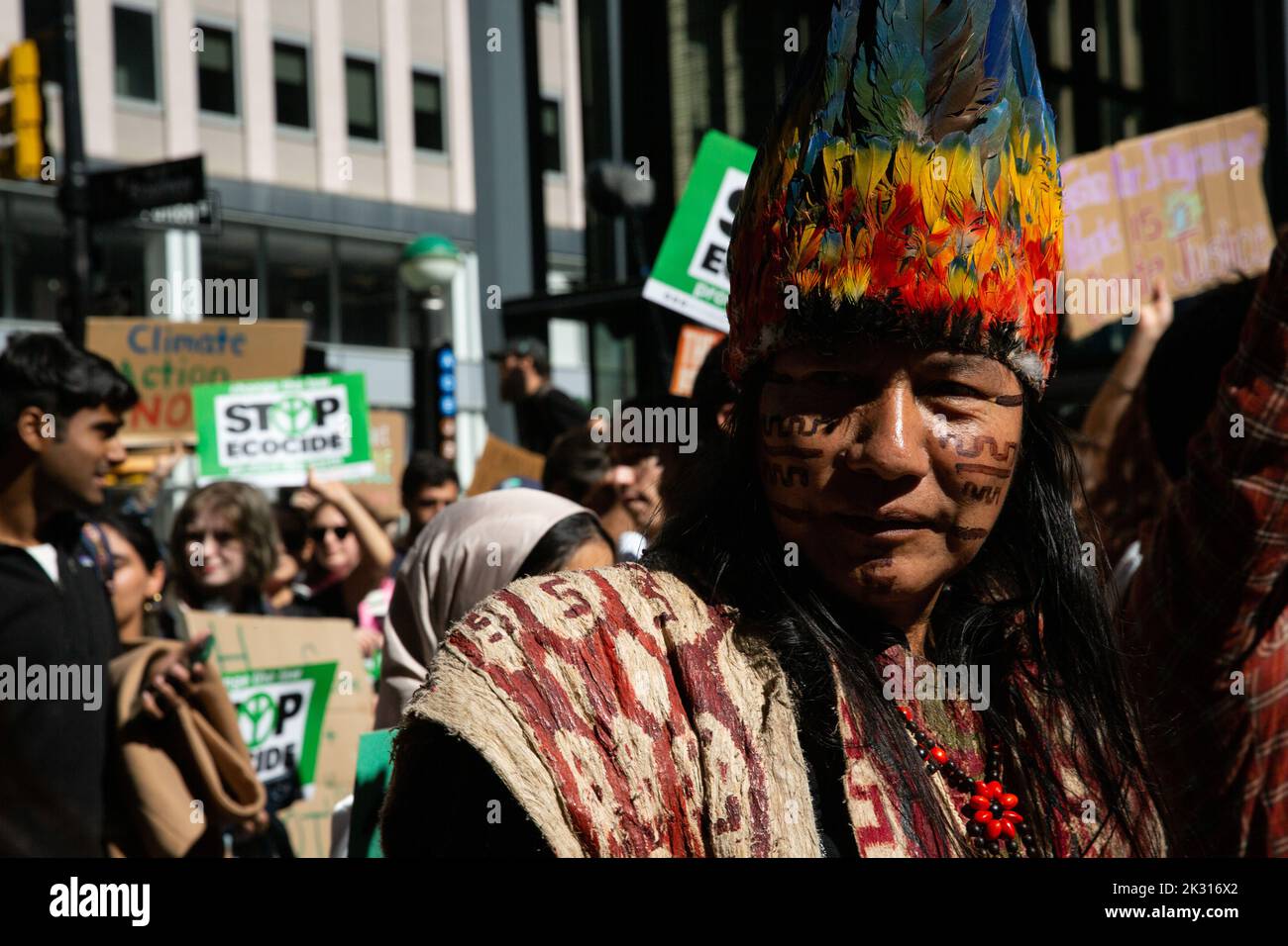 New York City, United States. 23rd Sep, 2022. Indigenous protester wears headdress and makeup during the climate strike. Hundreds of youth climate protesters marched from Foley Square to Battery Park with Fridays for the Future International Climate Strike. Credit: SOPA Images Limited/Alamy Live News Stock Photo