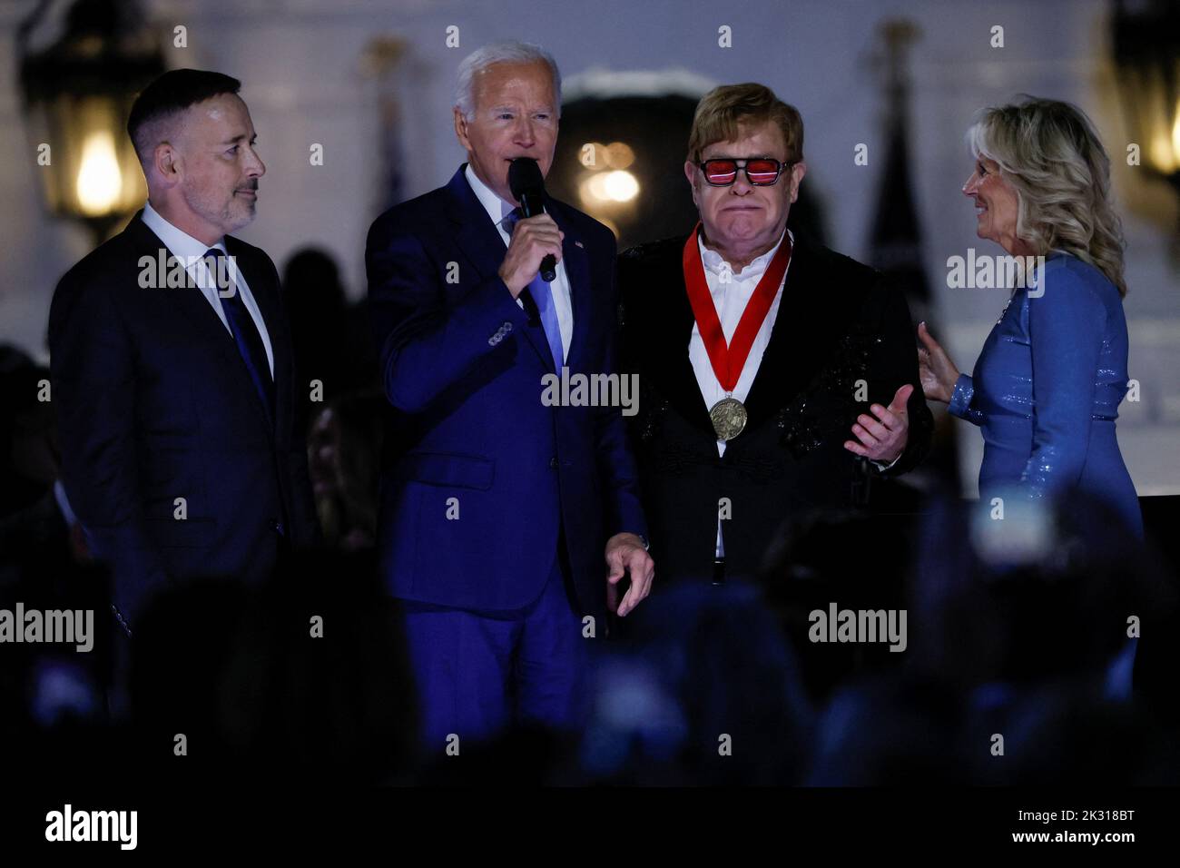 British rocker Elton John reacts after being awarded the National Humanities Medal by U.S. President Joe Biden and U.S. first lady Jill Biden at the White House in Washington, U.S., September 23, 2022. REUTERS/Evelyn Hockstein Stock Photo
