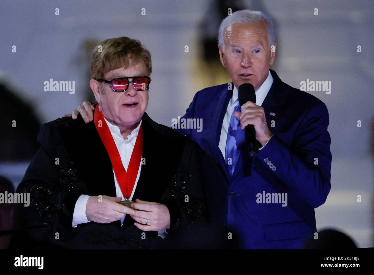 British rocker Elton John is awarded the National Humanities Medal by U.S. President Joe Biden at the White House in Washington, U.S., September 23, 2022. REUTERS/Evelyn Hockstein Stock Photo