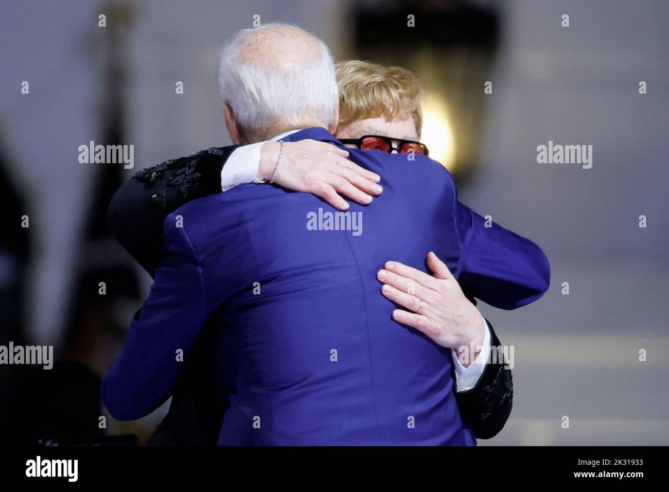 British rocker Elton John hugs U.S. President Joe Biden after being awarded the National Humanities Medal at the White House in Washington, U.S., September 23, 2022. REUTERS/Evelyn Hockstein Stock Photo