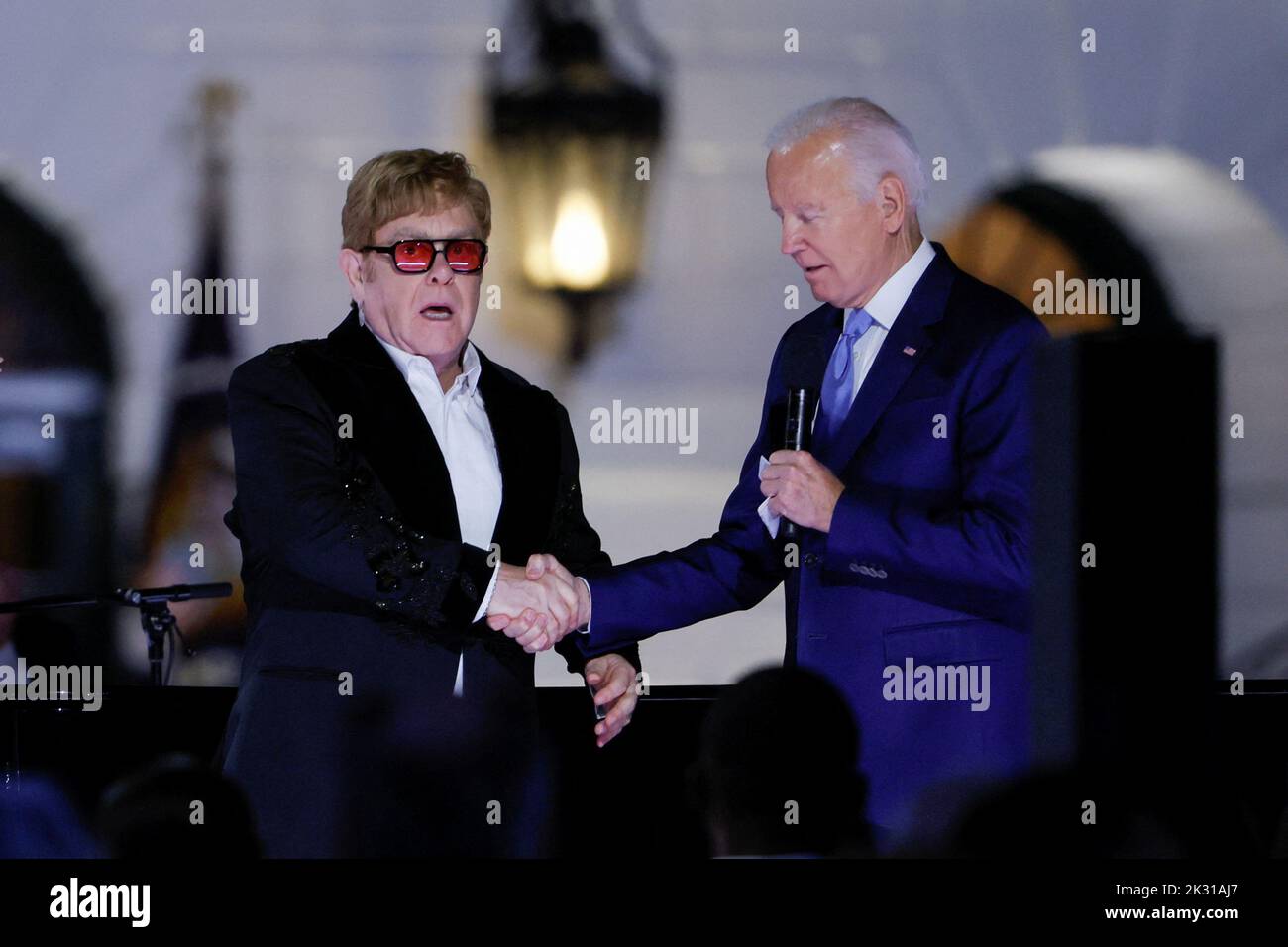 British rocker Elton John reacts to being awarded the National Humanities Medal by U.S. President Joe Biden at the White House in Washington, U.S., September 23, 2022. REUTERS/Evelyn Hockstein Stock Photo