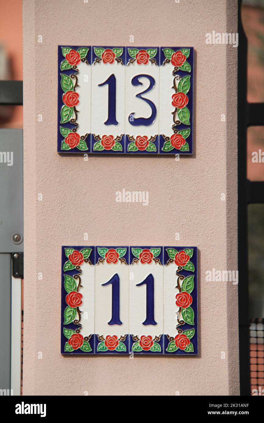 House numbers on ceramic tiles in Italy Stock Photo