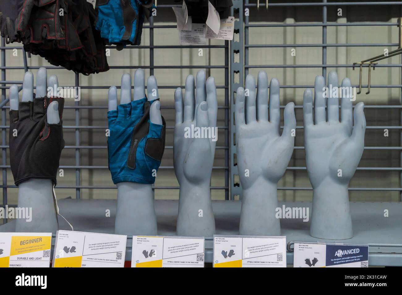 Howrah, West Bengal, India - 26th October 2020 : Various weight training gloves on sale at Decathlon store of Uluberia, Howrah. Stock Photo