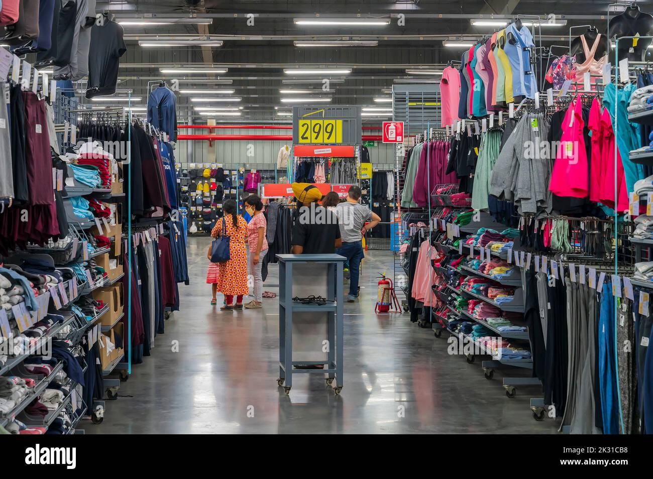 Howrah, West Bengal, India - 26th October 2020 : Indian buyers checking out various sports goods on sale at Decathlon store of Uluberia, Howrah. Stock Photo