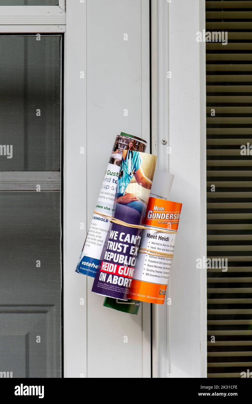 Vadnais Heights, Minnesota. Political candidates for the midterm elections leave their brochures on door handles so people will vote for them. Stock Photo