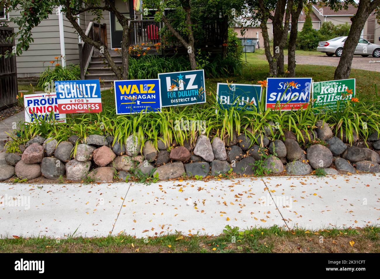 Duluth, Minnesota. Variety of political campaign signs in homeowners front yard for the midterm elections. Stock Photo