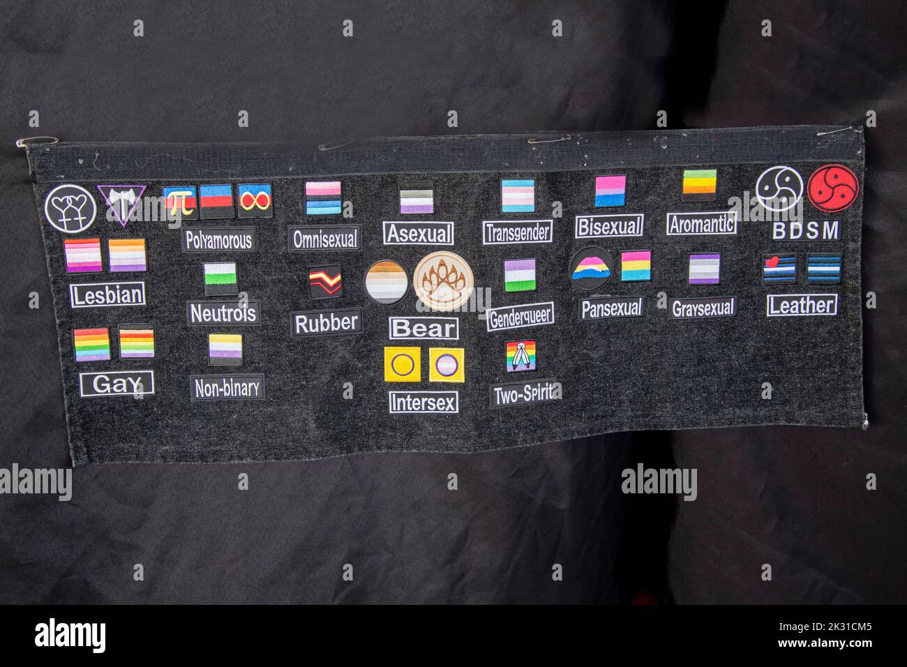 Kansas City, Missouri. A selection of gender and sexual preferance name tag patches for sale in flea market. Stock Photo
