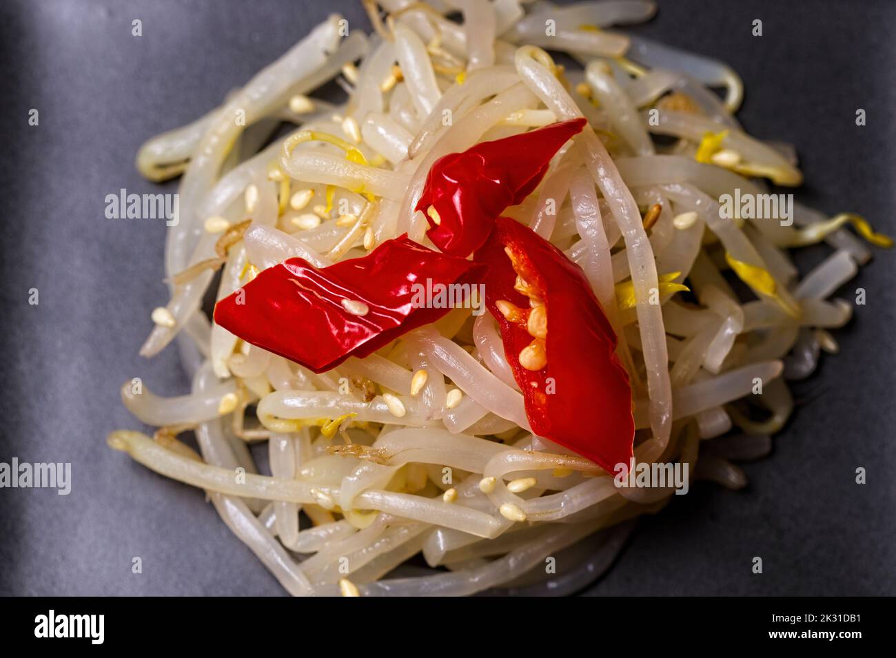 A Flat Lay Photo Of A Stack Of Bean Sprouts That Were Cooked In Fish a-flat-lay-photo-of-a-stack-of-bean-sprouts-that-were-cooked-in-fish