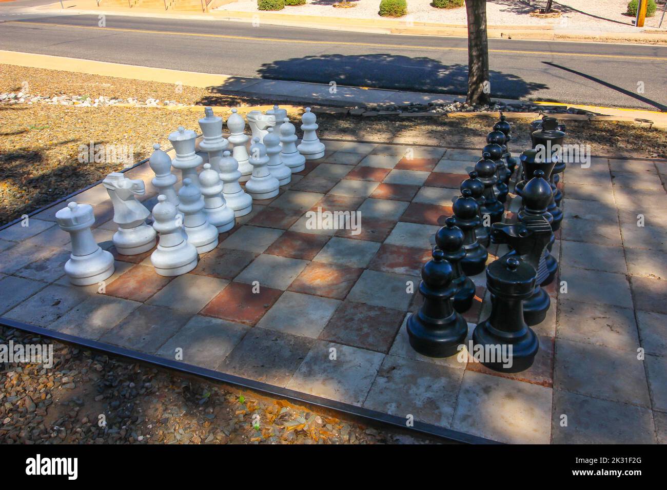 Large Lawn Chess Pieces On Display Stock Photo