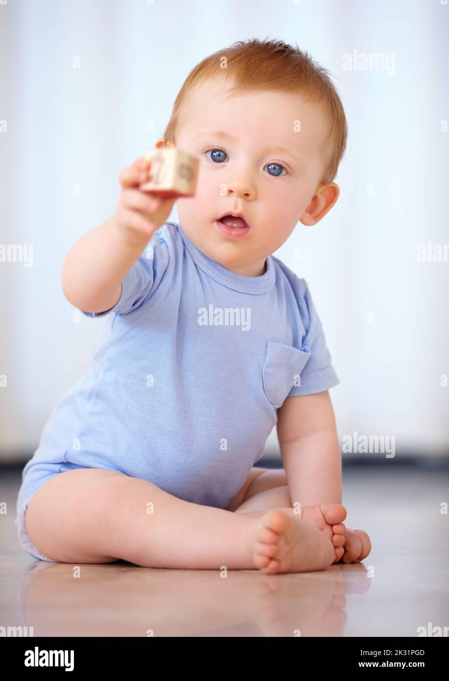 Growing up in the safety of home. an adorable baby boy in his home. Stock Photo