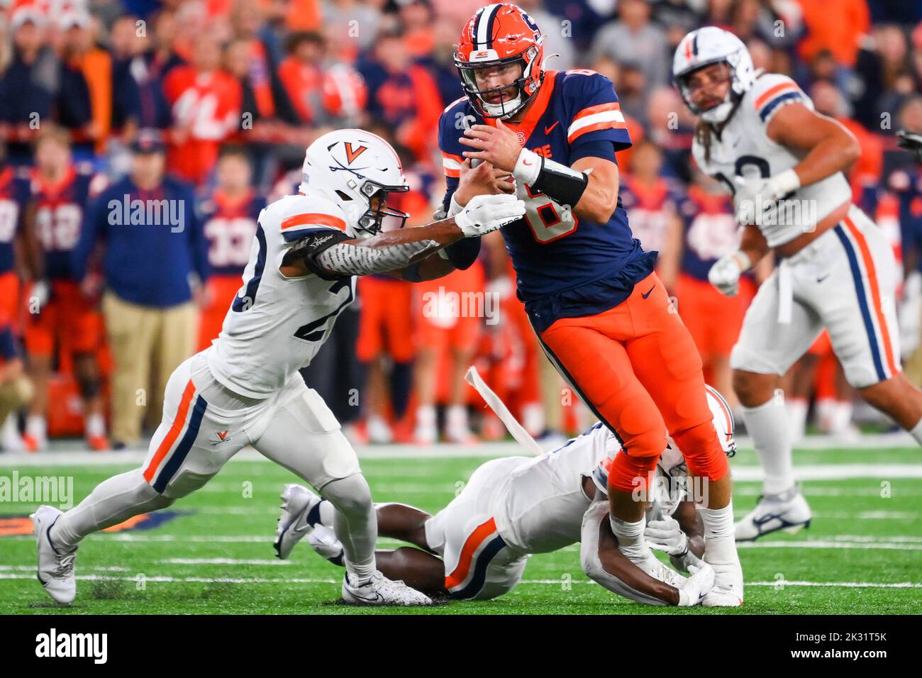 September 23, 2022: Syracuse Orange quarterback Garrett Shrader (6) runs with the ball as Virginia Cavaliers defensive back Jonas Sanker (left) defends during the second half on Friday, Sep., 23, 2022 at the JMA Wireless Dome in Syracuse, New York. Rich Barnes/CSM Stock Photo