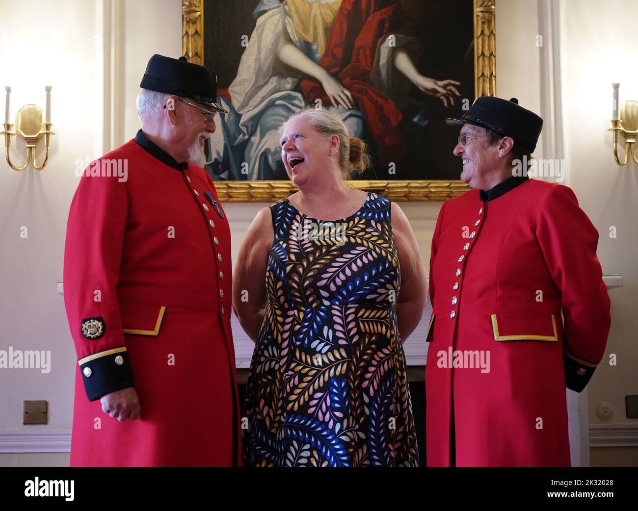 Previously unissued photo dated 08/09/22 of Vanessa Sloane, Deputy Chief nurse at Chelsea and Westminster hospital, with Chelsea Pensioners Peter Turner, 73, and Monica Parrott, 76, after she gave them the autumn Covid booster vaccinations, at the Royal Hospital Chelsea, London. Issue date: Saturday September 24, 2022. Stock Photo