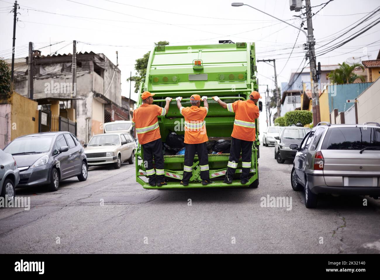 Garbage collection day. a garbage collection team at work Stock Photo