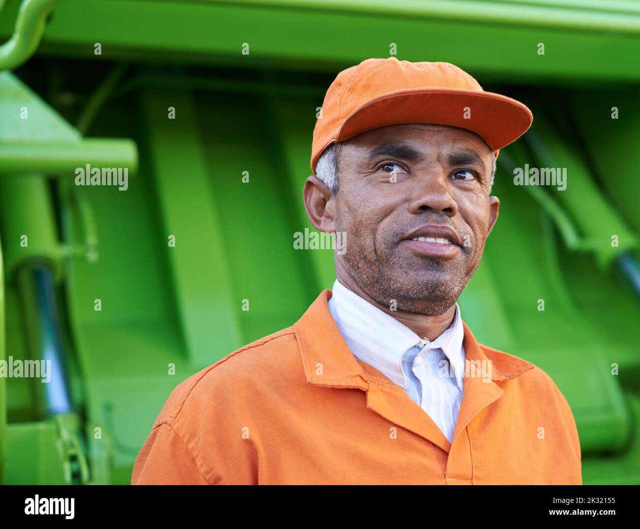 Hes keeping our streets clean. a male worker on garbage day. Stock Photo