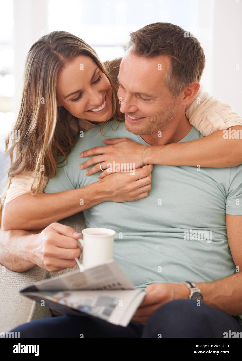 Wife hugging husband from behind hi-res stock photography and images ...