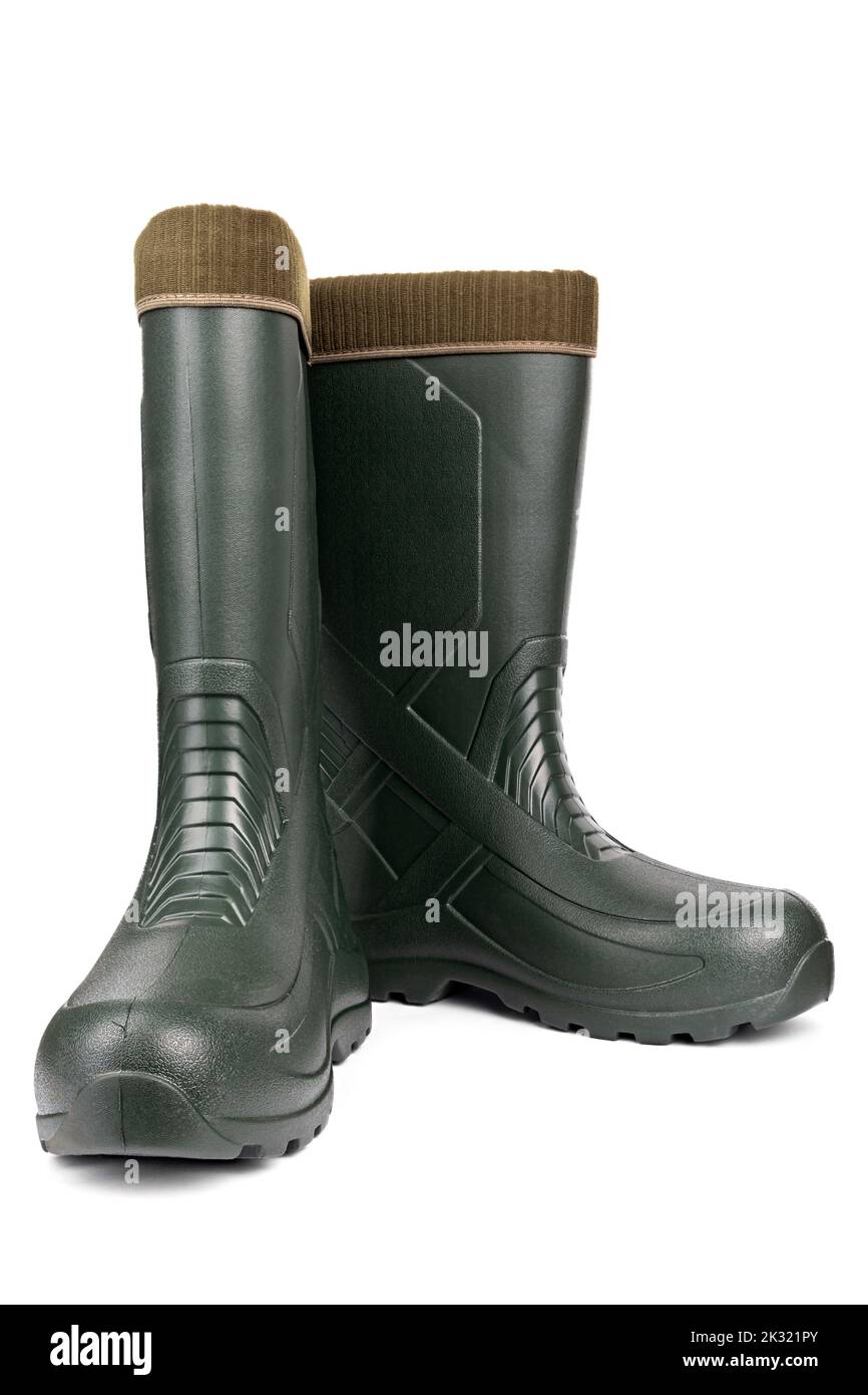 Green rubber boots with a warm toe on a white background. Men's shoes