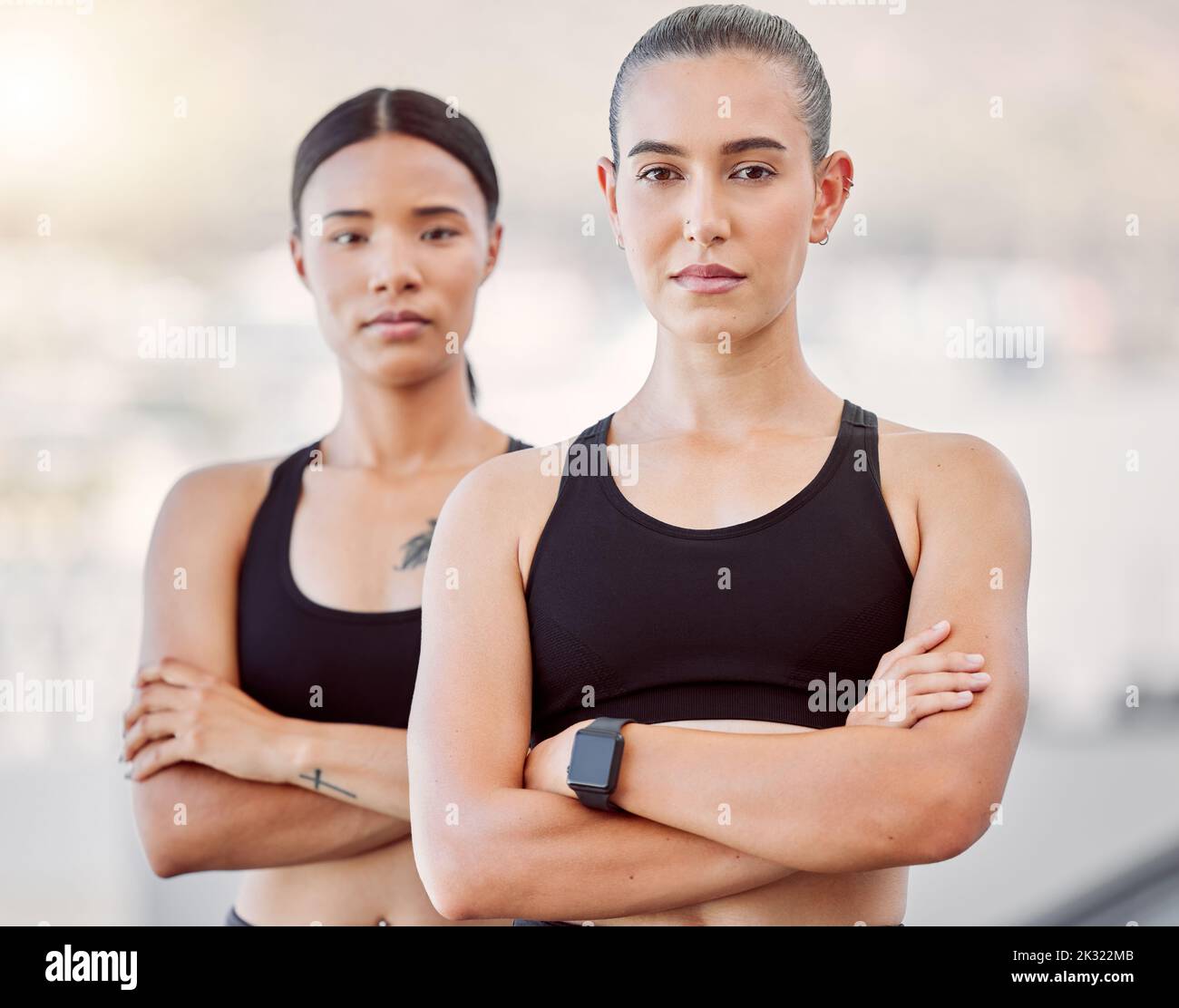 Fitness women, workout friends and exercise during athlete training, running and health goals while looking serious and ready outside. Portrait of Stock Photo