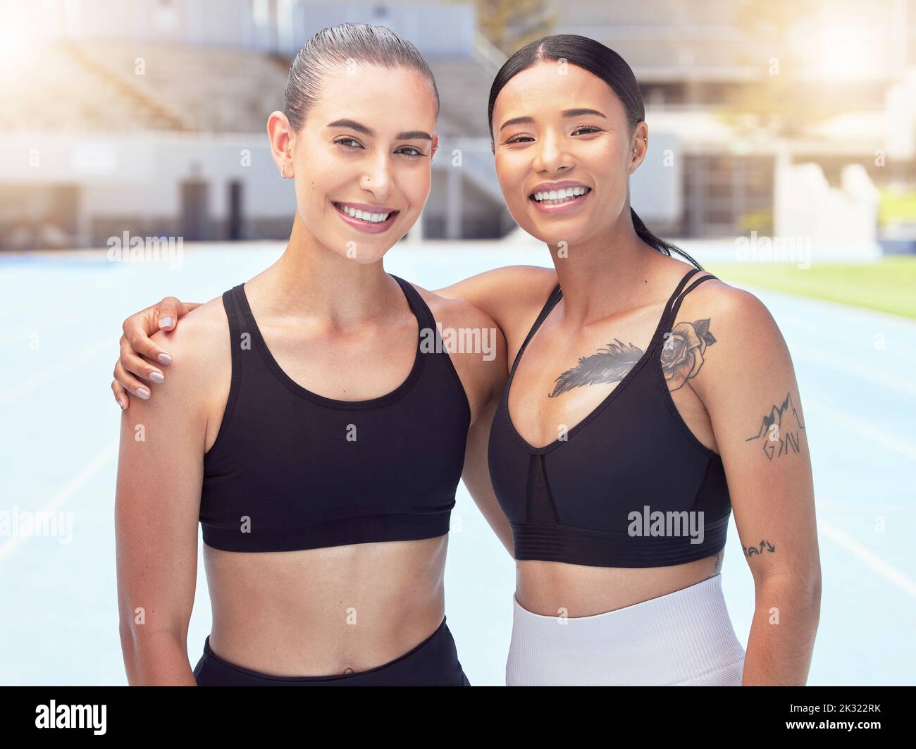 Sports women portrait, track runners and athletes training for exercise, workout and marathon at stadium arena outdoors. Happy, smile and healthy Stock Photo