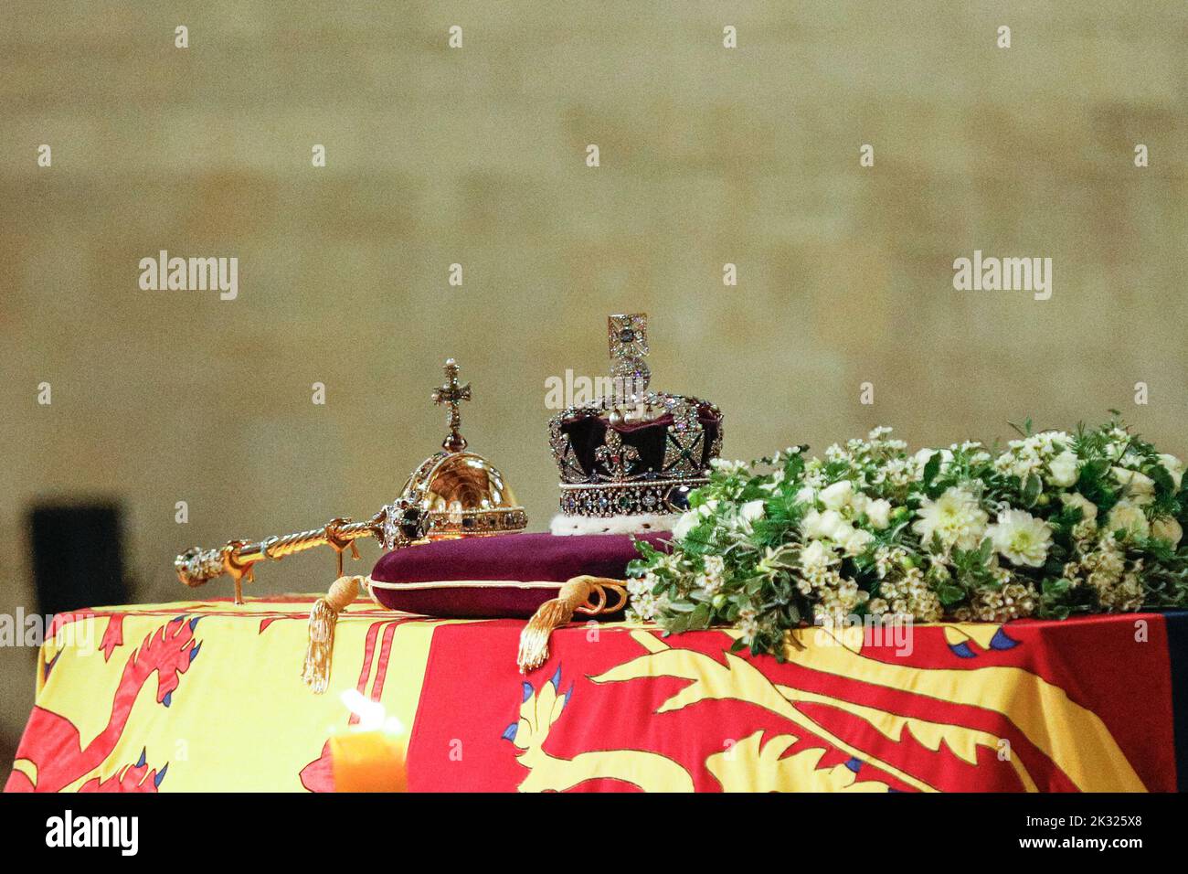 The crown and ceptre on top of the coffin of Queen Elizabeth II during the lying-in-state period at Westminster Hall, London, England, UK Stock Photo