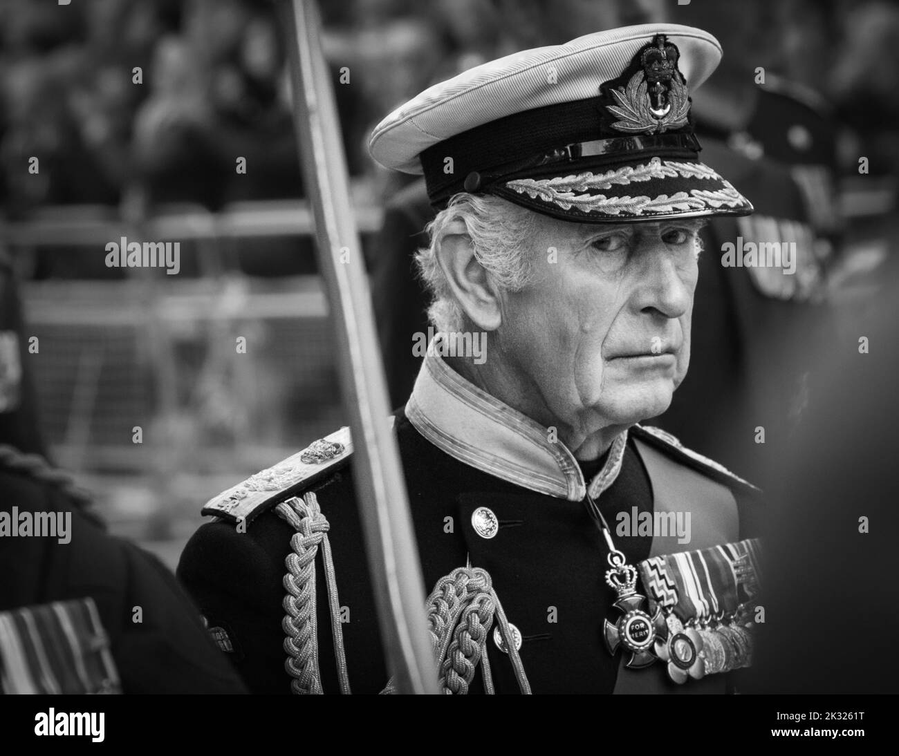 King Charles III, the  monarch in close up, walks in Queen Elizabeth II funeral procession in London, England, United Kingdom Stock Photo