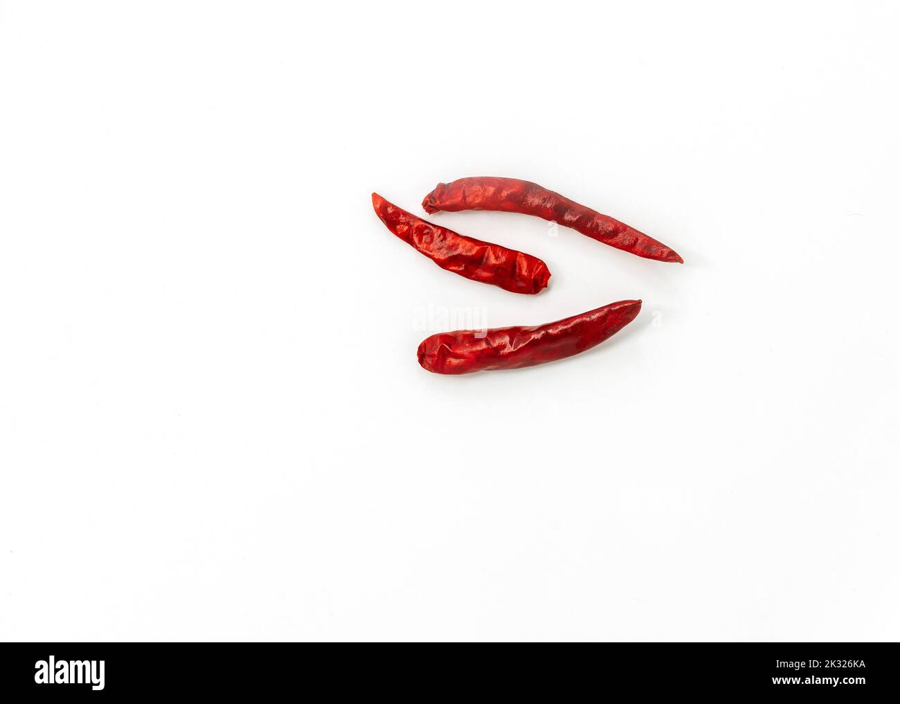 Isolated dried chili on white background, top view image of dried chili. Stock Photo
