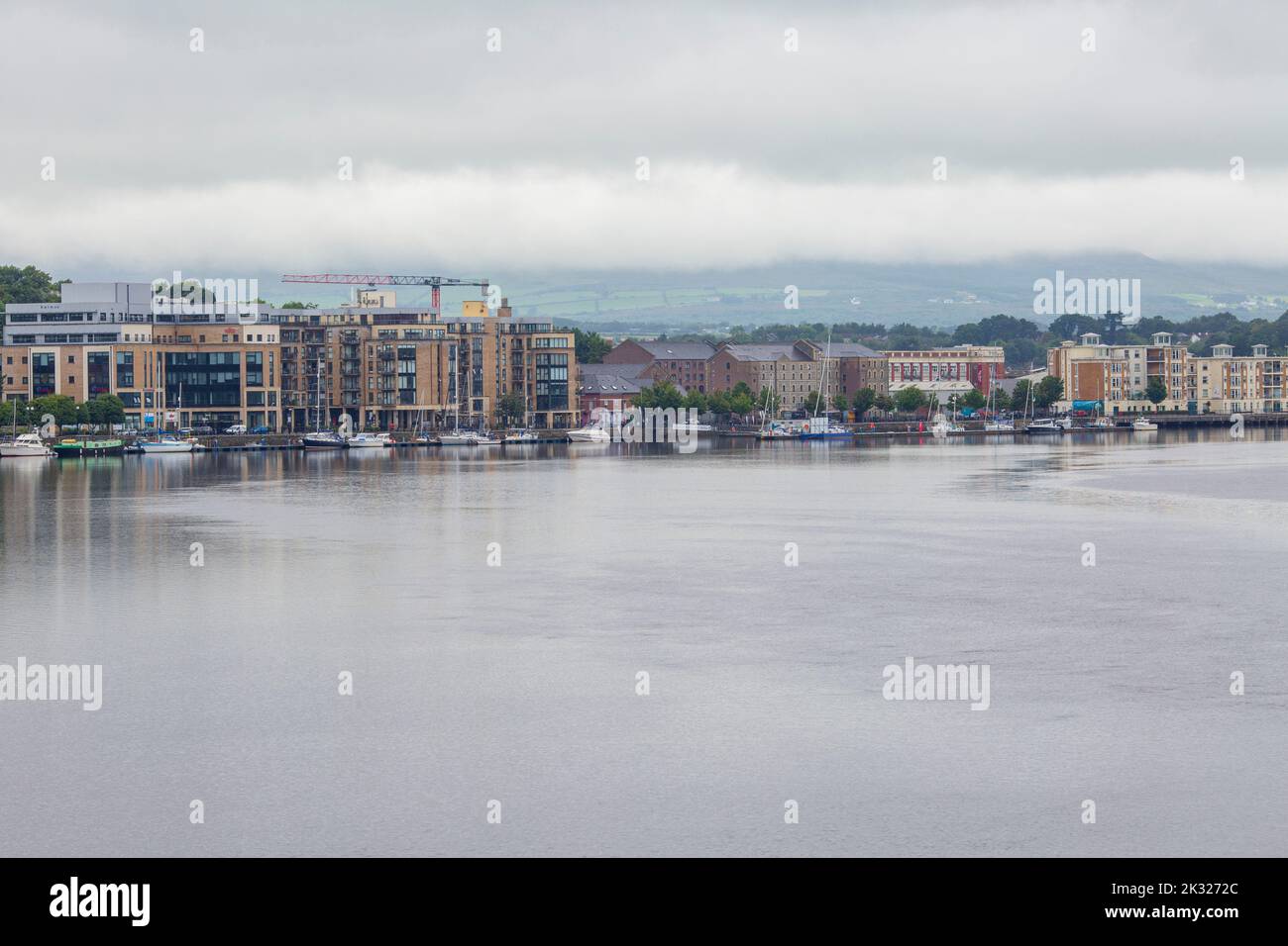Foyle river with Derry/Londonderry skyline in the background Stock Photo