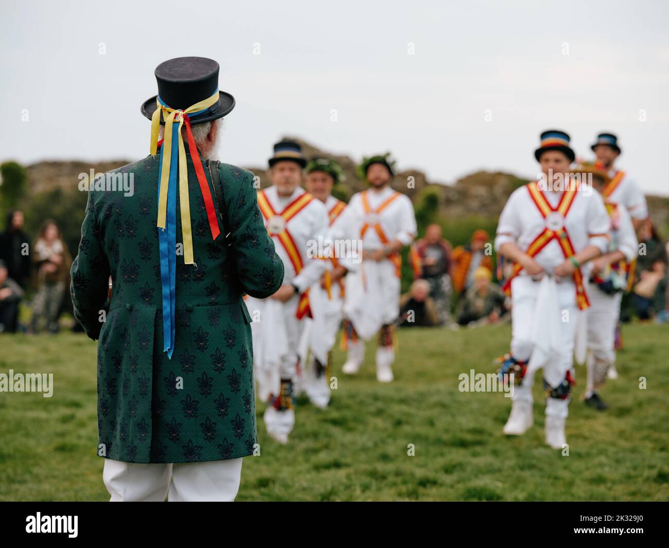 Sunrise morris dancers dancing in the Ladies Parlour West Hill in the Jack in the Green festival May 2022 - Hastings East Sussex England UK Stock Photo