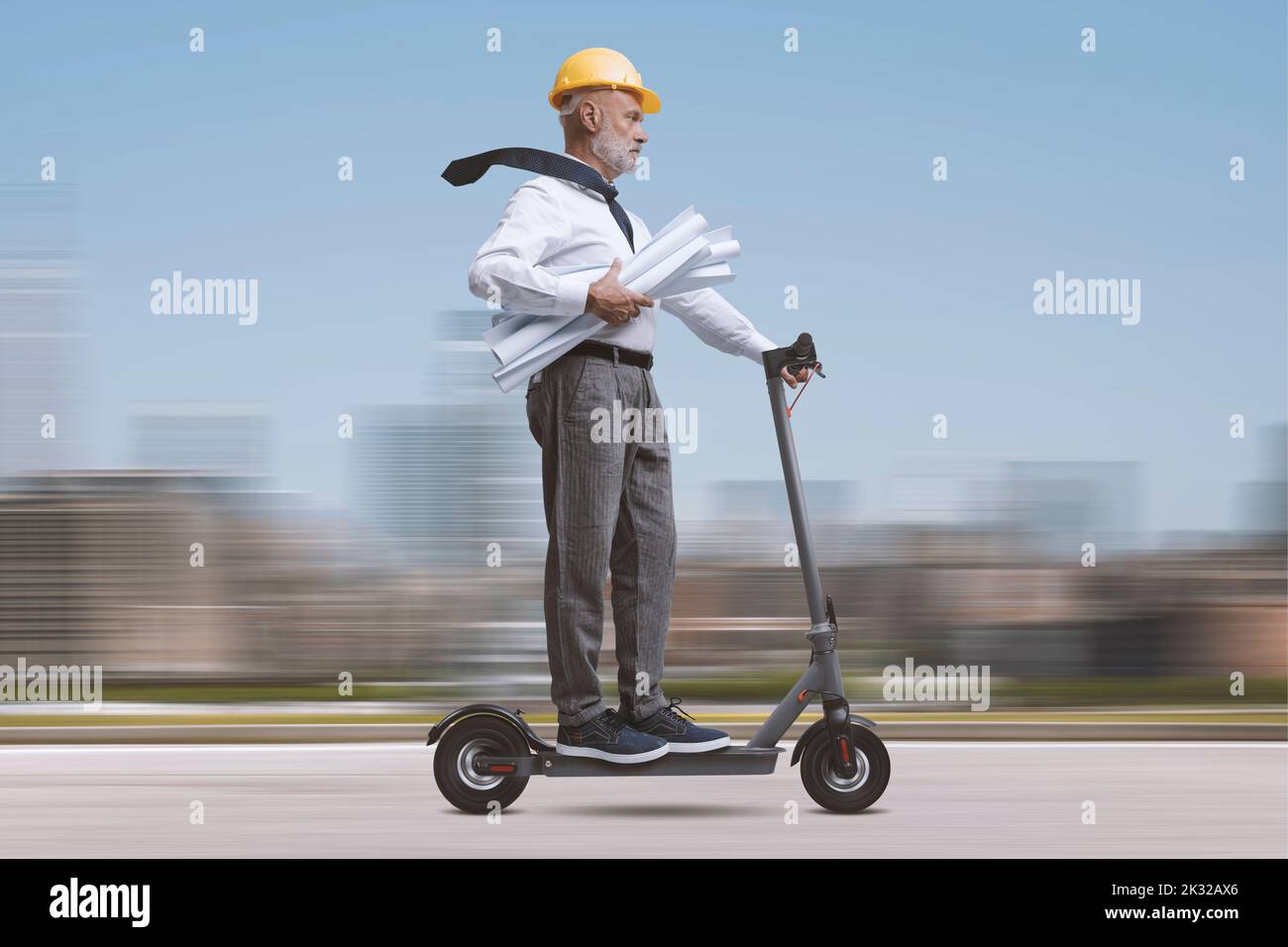 Professional engineer and architect wearing a safety helmet and riding ...
