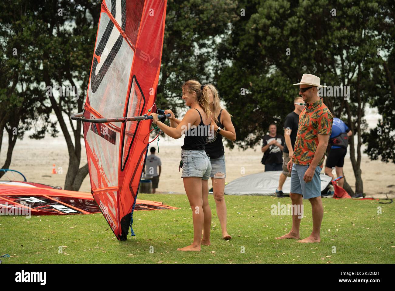 Two women competitors sets up their equipment to compete the New
