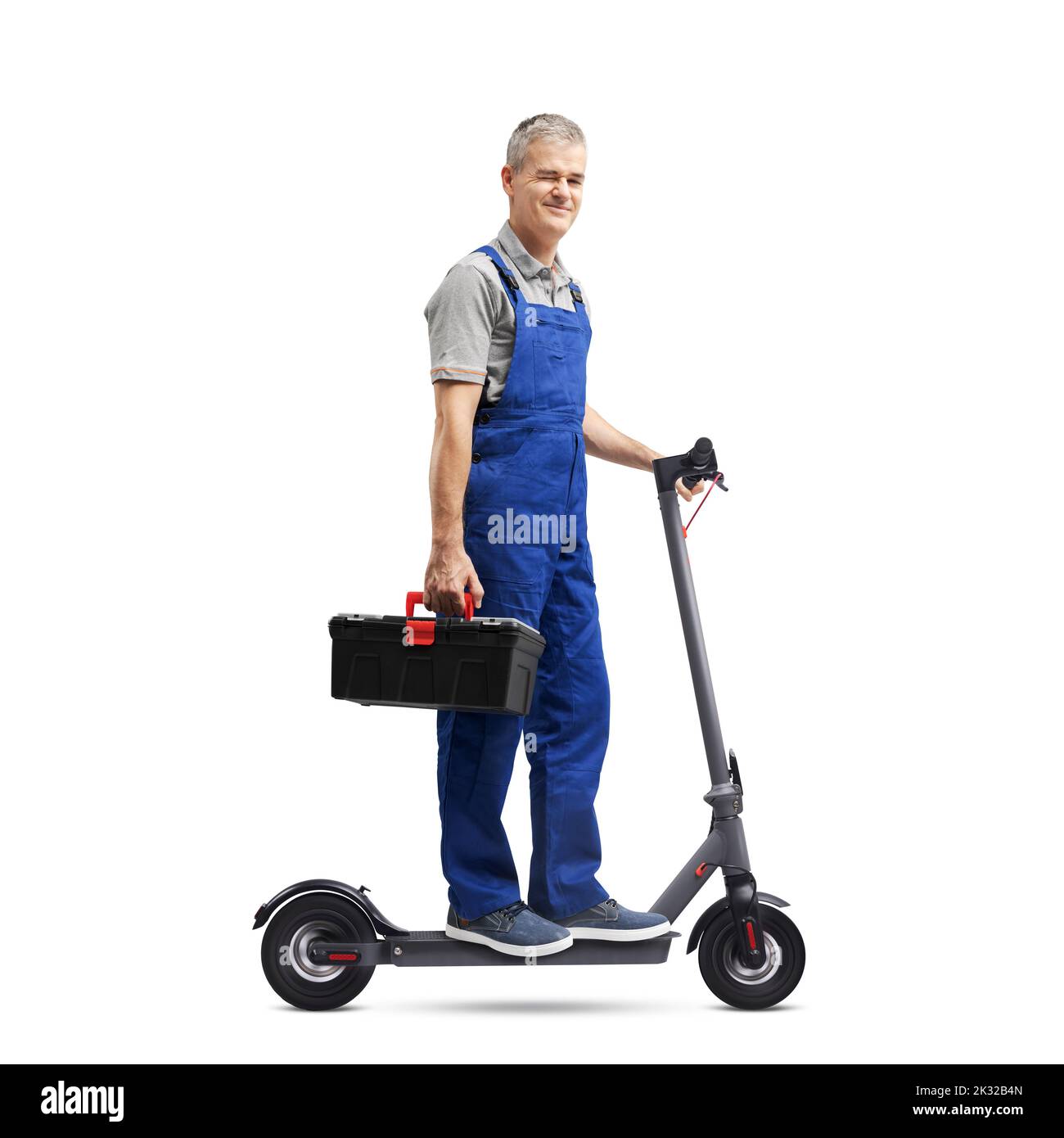 Professional fast repairman riding an electric scooter and winking