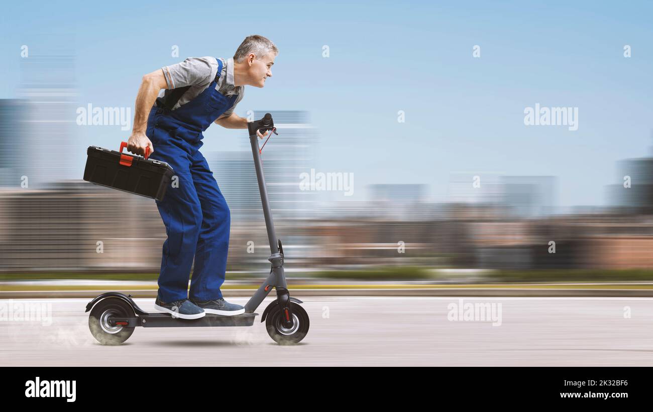 Professional quick repairman holding a toolbox and riding an electric